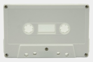 White audiocassettes with screws